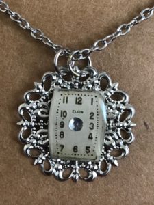 Elgin Watch on silver doily charm