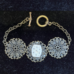 Bracelet, 3 Bronze filigree Pendants with Bronze Chain and Barrel shaped Elgin Watch Face