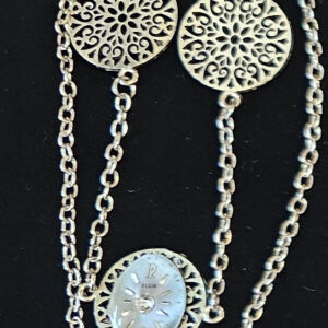 Necklace, silver tone 3/4" round three medallion with round watch face, 16" chain, lobster clasp