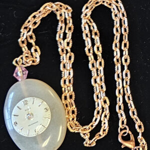 Necklace, rose gold tone with 1  x 1 3/8 " Oval pendant with round watch face, 18" chain, lobster clasp
